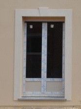 Encadrement en relief sur une façade à montataire 60